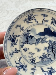 23 Chinese blue and white saucers with figural design, Yongzheng/Kangxi