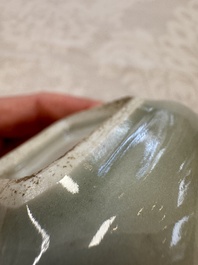 A Chinese Nanking water pot, a blue and white brush pot, a jarlet and a trick cup, Ming and later