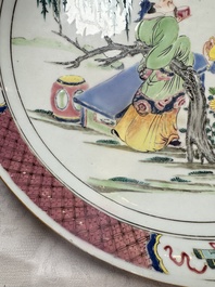 A Chinese famille rose 'Wine Drinking Sage and Attendant' dish, Yongzheng