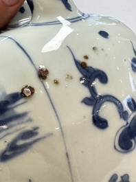 A Chinese blue and white 'Mythical Beasts' wine pot and cover, Transitional period