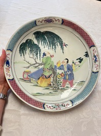 A Chinese famille rose 'Wine Drinking Sage and Attendant' dish, Yongzheng
