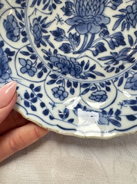 Seven Chinese blue and white plates with figural and floral design, 18/19th C.