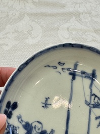 23 Chinese blue and white saucers with figural design, Yongzheng/Kangxi