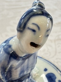 A rare Japanese blue and white 'Pipe Smoker' incense burner and cover, Edo, 17th C.