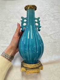 A pair of gilt-bronze-mounted Chinese turquoise-glazed vases, 19th C.