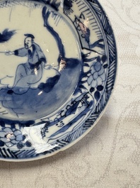23 Chinese blue and white saucers with figural design, Yongzheng/Kangxi