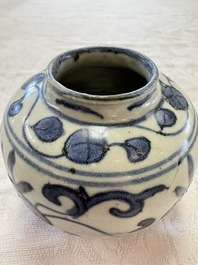 A Chinese Nanking water pot, a blue and white brush pot, a jarlet and a trick cup, Ming and later