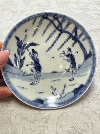 23 Chinese blue and white saucers with figural design, Yongzheng/Kangxi