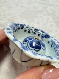 A Chinese Nanking water pot, a blue and white brush pot, a jarlet and a trick cup, Ming and later