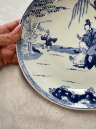 Seven Chinese blue and white plates with figural and floral design, 18/19th C.