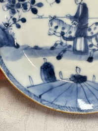 23 Chinese blue and white saucers with figural design, Yongzheng/Kangxi