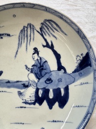 Seven Chinese blue and white plates with figural and floral design, 18/19th C.
