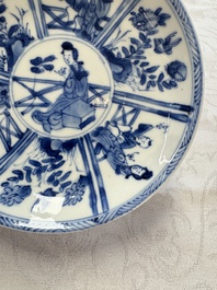 23 Chinese blue and white saucers with figural design, Yongzheng/Kangxi