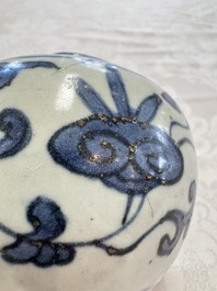 A Chinese Nanking water pot, a blue and white brush pot, a jarlet and a trick cup, Ming and later