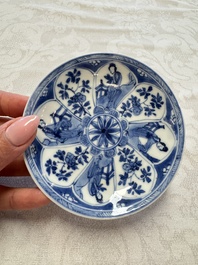 23 Chinese blue and white saucers with figural design, Yongzheng/Kangxi
