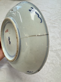 Seven Chinese blue and white plates with figural and floral design, 18/19th C.