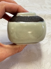 A Chinese Nanking water pot, a blue and white brush pot, a jarlet and a trick cup, Ming and later