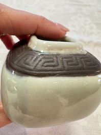 A Chinese Nanking water pot, a blue and white brush pot, a jarlet and a trick cup, Ming and later