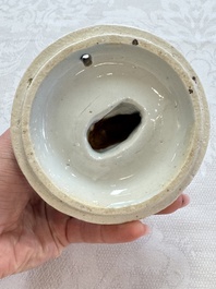 A rare Japanese blue and white 'Pipe Smoker' incense burner and cover, Edo, 17th C.