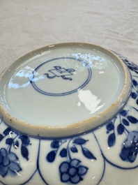 Seven Chinese blue and white plates with figural and floral design, 18/19th C.