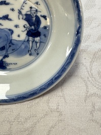 23 Chinese blue and white saucers with figural design, Yongzheng/Kangxi