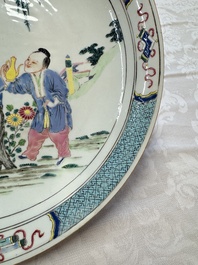 A Chinese famille rose 'Wine Drinking Sage and Attendant' dish, Yongzheng