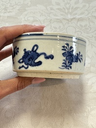 A rare Japanese blue and white 'Pipe Smoker' incense burner and cover, Edo, 17th C.