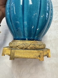 A pair of gilt-bronze-mounted Chinese turquoise-glazed vases, 19th C.