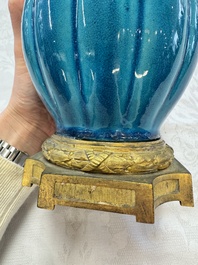 A pair of gilt-bronze-mounted Chinese turquoise-glazed vases, 19th C.