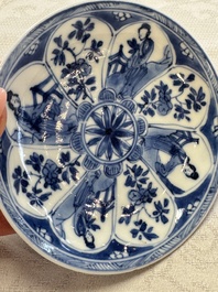 23 Chinese blue and white saucers with figural design, Yongzheng/Kangxi