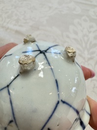 A Chinese Nanking water pot, a blue and white brush pot, a jarlet and a trick cup, Ming and later