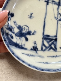23 Chinese blue and white saucers with figural design, Yongzheng/Kangxi