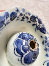A Chinese Nanking water pot, a blue and white brush pot, a jarlet and a trick cup, Ming and later