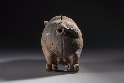 A Javanese terracotta boar-shaped money bank, probably Majapahit Kingdom, 15th C.