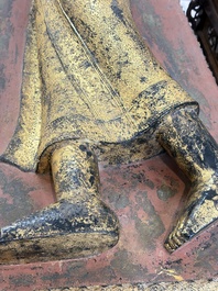 An exceptional and large gilt-lacquered bronze figure of the reclining Parinirvana Buddha, Thailand, 18th C.