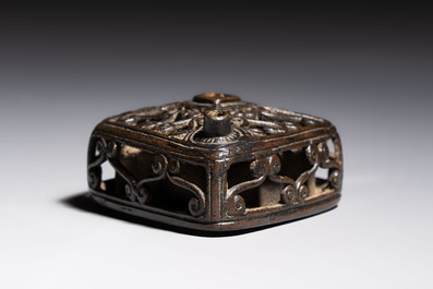 A Chinese openworked double-walled lozenge-shaped bronze water dropper, Ming