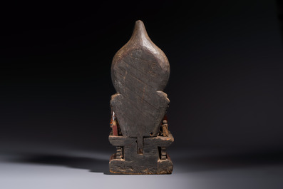 A Chinese gilt-lacquered wooden Bodhisattva and attendants on a throne, Qing