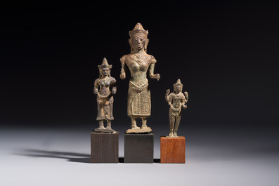 Five bronze figures of divinities, probably Cambodia, 12/13th C.