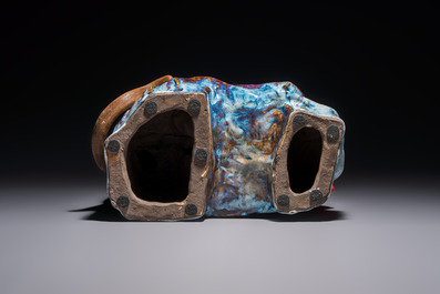 A Chinese polychrome-glazed Shiwan stoneware 'Monkey and Peach' group, signed, 20th C.