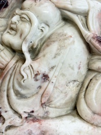 A Chinese carved soapstone 'Luohan' group on a wooden stand, Republic