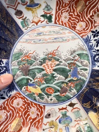 A pair of Chinese famille verte 'Sea Creatures' lobed plates, Kangxi