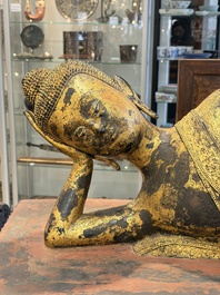An exceptional and large gilt-lacquered bronze figure of the reclining Parinirvana Buddha, Thailand, 18th C.