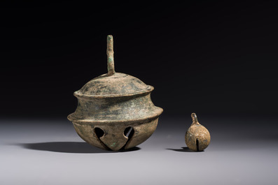 Two Cambodian bronze bells, a vajra bell and a vajra, 11/13th C.