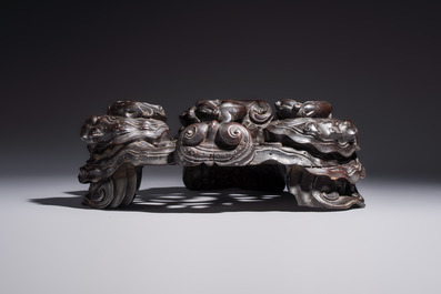 Two large Chinese carved wooden stands, 19th C.