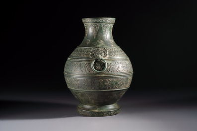 An extremely rare Chinese archaic bronze wine vessel, 'Hu 壺', Warring States period