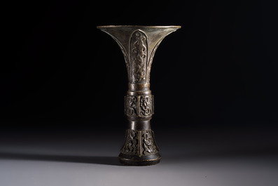 A Chinese archaistic bronze vase with Chilong design, 'Gu 觚', Ming