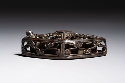 A Chinese openworked double-walled lozenge-shaped bronze water dropper, Ming