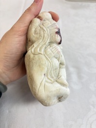 A Chinese carved soapstone 'Luohan' group on a wooden stand, Republic