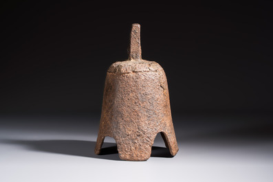 Seven various Chinese bronze and cast-iron bells, Han and later