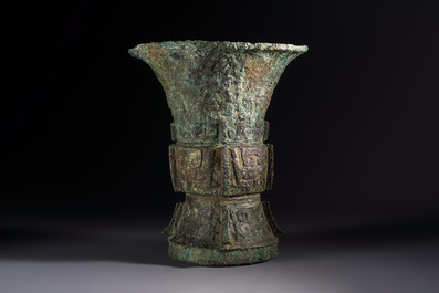 A Chinese archaic bronze ritual wine vessel with Taotie design, 'Zun 尊', Shang